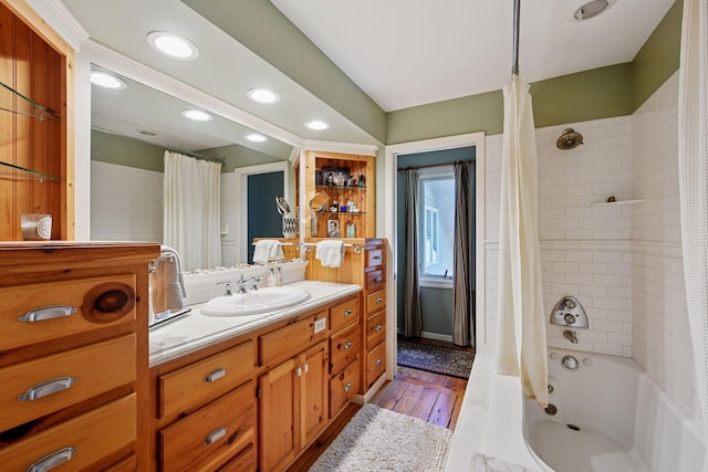 5150 Meadville St, Greenwood, MN 55331 - full bathroom featuring vanity, shower / bath combo, wood finished floors, and recessed lighting