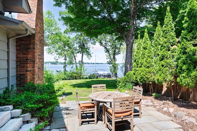 5150 Meadville St, Greenwood, MN 55331 - view of patio / terrace with outdoor dining area and a water view