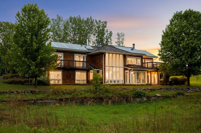 12697 177th St N, May Twp, MN 55047 - rear view of property featuring a balcony and solar panels