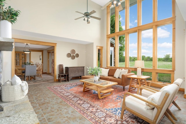 12697 177th St N, May Twp, MN 55047 - living area featuring plenty of natural light, a towering ceiling, and ceiling fan
