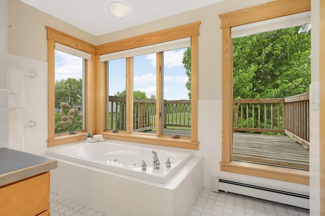 12697 177th St N, May Twp, MN 55047 - full bath with a baseboard heating unit, a jetted tub, healthy amount of natural light, and vanity
