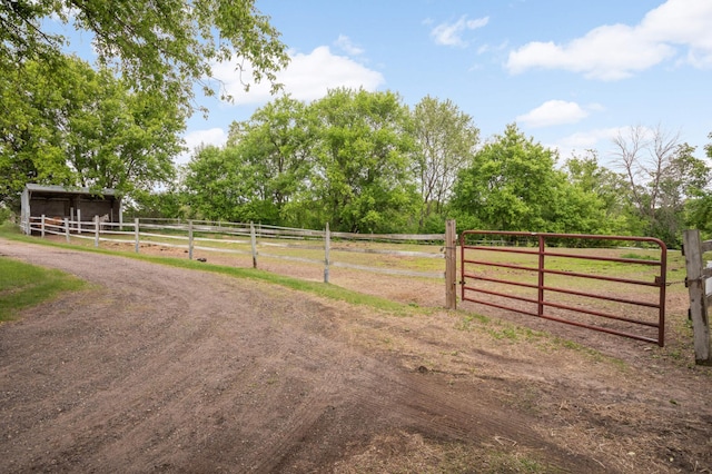 12697 177th St N, May Twp, MN 55047 - view of street featuring a view of countryside and an exterior structure