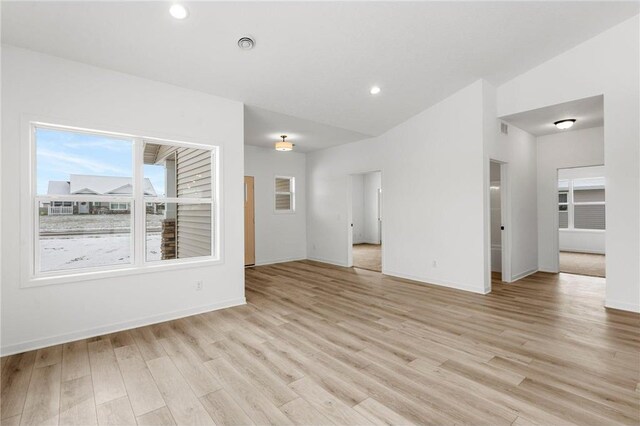 260 Spring St, Osceola, WI 54020 - spare room with baseboards, recessed lighting, and light wood-style floors