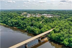 260 Spring St, Osceola, WI 54020 - drone / aerial view with a water view and a forest view