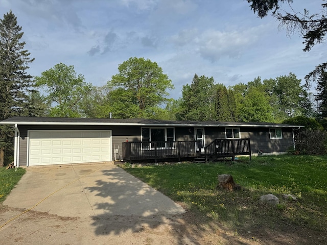29829 400th Ave, Roseau, MN 56751 - ranch-style home with driveway, an attached garage, a front lawn, and a deck