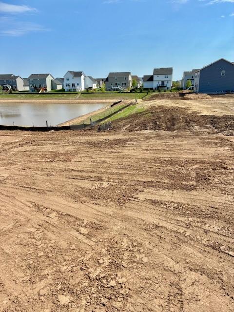 6187 Jensen Alcove S, Cottage Grove, MN 55016 - view of yard with a residential view and a water view