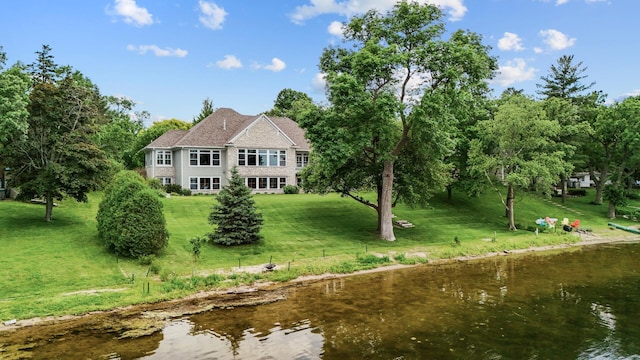 1505 Edgewater Ave, Arden Hills, MN 55112 - rear view of house featuring a water view and a lawn