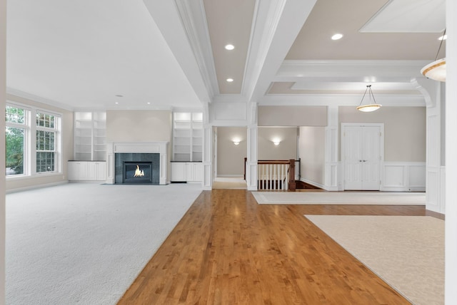 1505 Edgewater Ave, Arden Hills, MN 55112 - unfurnished living room with ornamental molding, a high end fireplace, built in shelves, recessed lighting, and wood finished floors