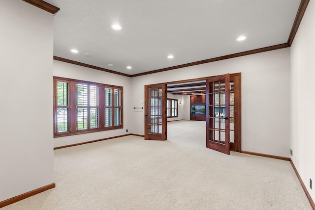 1505 Edgewater Ave, Arden Hills, MN 55112 - carpeted empty room with french doors, ornamental molding, and recessed lighting