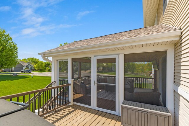 deck featuring a lawn