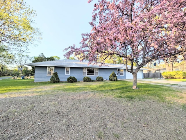 single story home with a garage