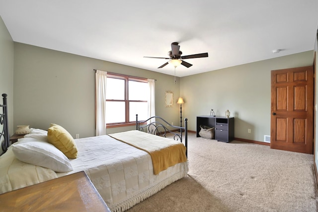 1572 44th St SW, Pine River, MN 56474 - carpeted bedroom with baseboards and ceiling fan