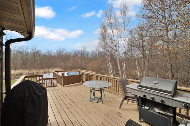 1572 44th St SW, Pine River, MN 56474 - wooden terrace featuring grilling area and a view of trees
