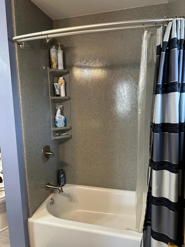 full bath featuring shower / tub combo