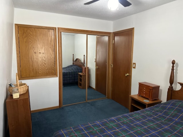 carpeted bedroom featuring ceiling fan and a closet