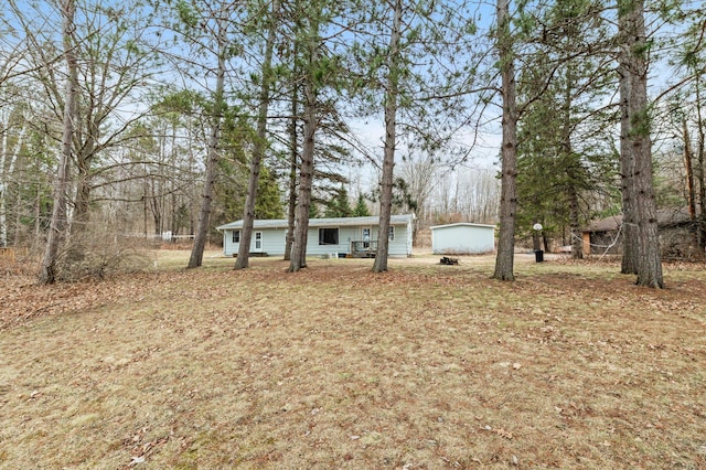 view of yard featuring a garage