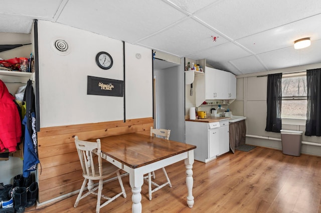 201 27 1/4 26 7/8 Avenue A, Cumberland, WI 54829 - dining room featuring a paneled ceiling and light wood-style flooring