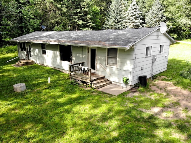 201 27 1/4 26 7/8 Avenue A, Cumberland, WI 54829 - ranch-style home featuring roof with shingles and a front yard