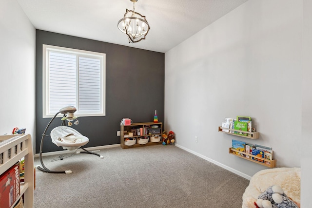 game room featuring a notable chandelier, carpet flooring, and baseboards