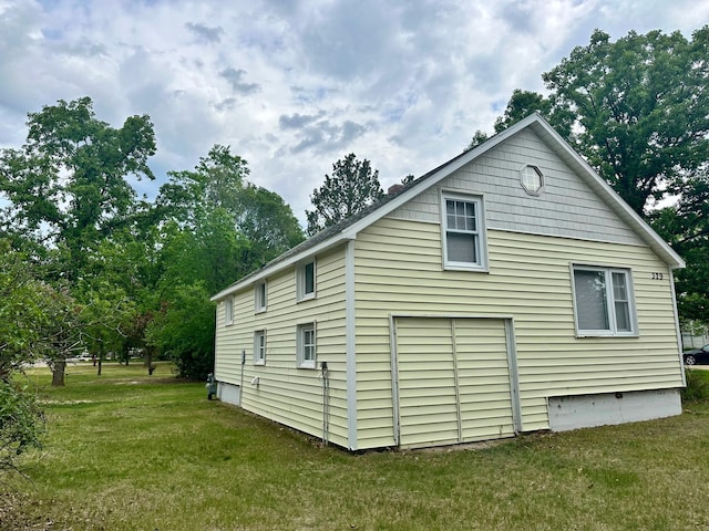 329 Main St NW, Menahga, MN 56464 - view of property exterior featuring a lawn