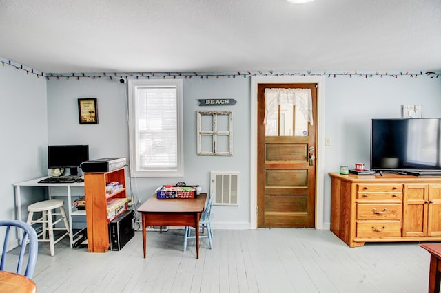 329 Main St NW, Menahga, MN 56464 - office area featuring light wood finished floors