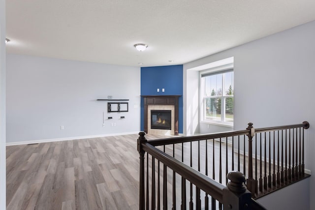 8949 Village Loop, Chanhassen, MN 55317 - corridor featuring wood finished floors and baseboards