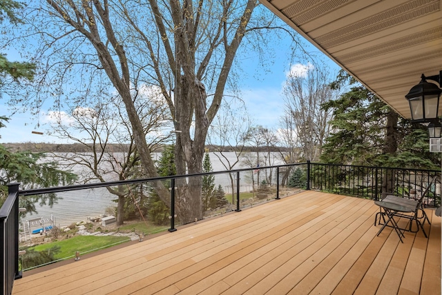 wooden terrace with a water view