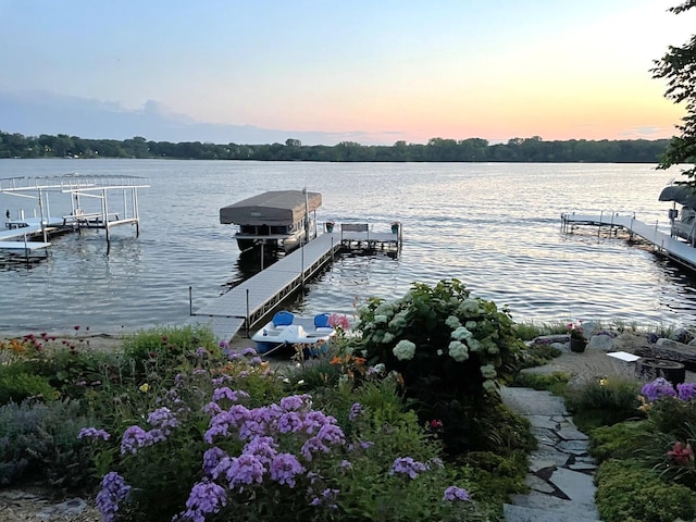 dock area featuring a water view and boat lift