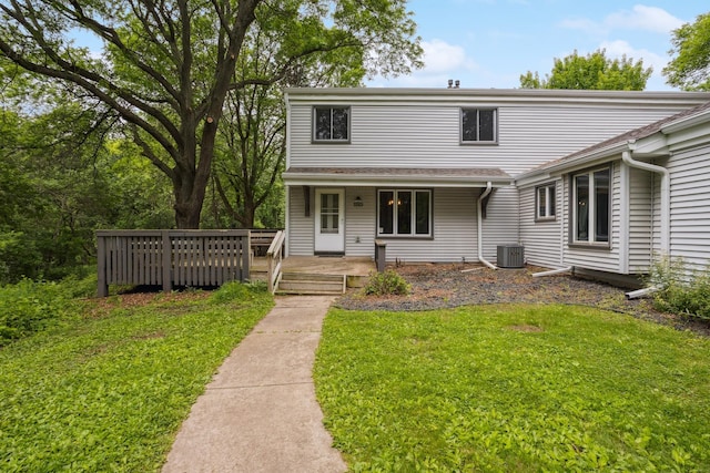 4854 Grenwich Trl N, Oakdale, MN 55128 - traditional home with a front lawn and a wooden deck