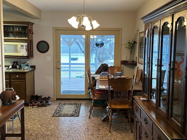 1213 Minnesota Ave, Detroit Lakes, MN 56501 - dining room with a chandelier