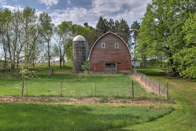 35449 Hastings St NE, Cambridge, MN 55008 - view of home's exterior with a barn, an outdoor structure, and a garage