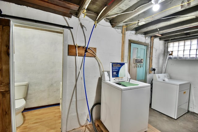 laundry room with washer and dryer and laundry area