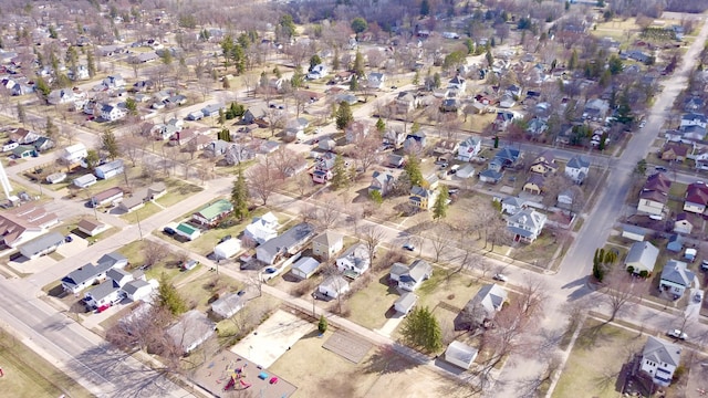 birds eye view of property with a residential view