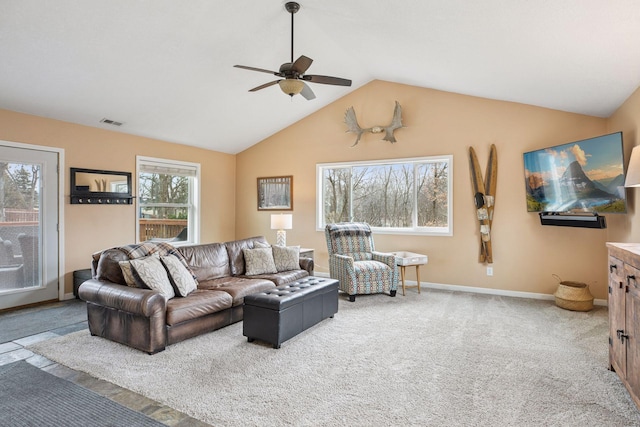living room with baseboards, vaulted ceiling, visible vents, ceiling fan, and carpet