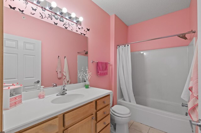 3600 Wooddale Ave S Unit 305, Saint Louis Park, MN 55416 - bathroom with toilet, shower / tub combo with curtain, vanity, a textured ceiling, and tile patterned flooring