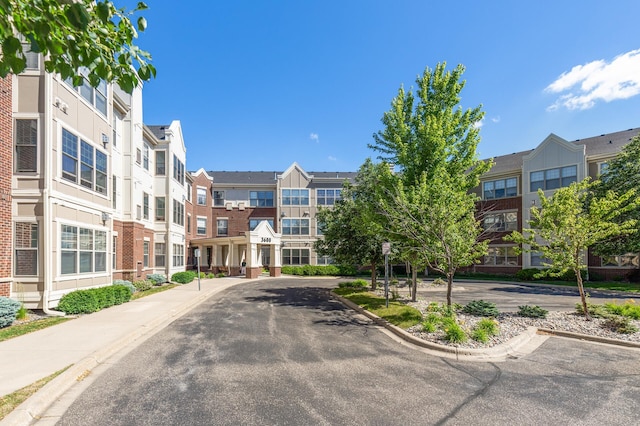 3600 Wooddale Ave S Unit 305, Saint Louis Park, MN 55416 - view of street featuring sidewalks, a residential view, and curbs