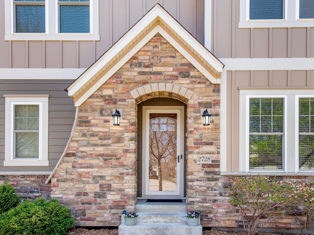 2728 Chowen Ave S, Minneapolis, MN 55416 - entrance to property featuring board and batten siding and stone siding