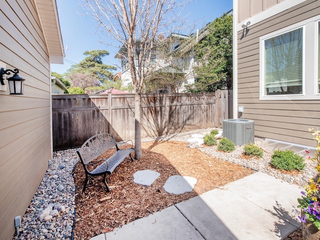 2728 Chowen Ave S, Minneapolis, MN 55416 - view of yard with a fenced backyard, cooling unit, and a patio area