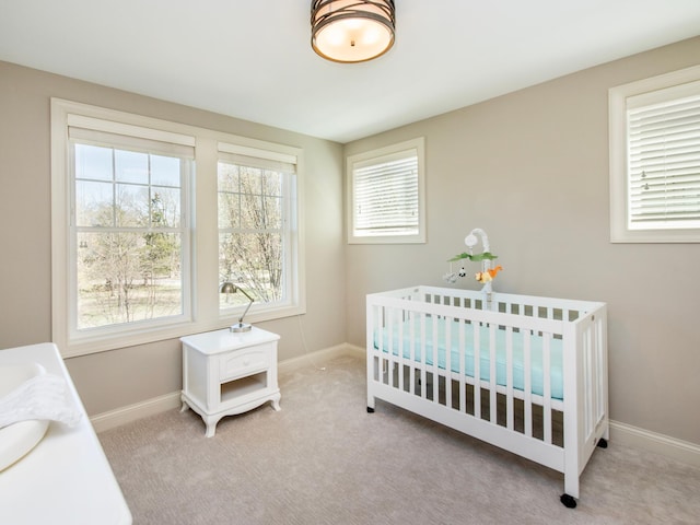 2728 Chowen Ave S, Minneapolis, MN 55416 - bedroom with carpet floors, baseboards, and a nursery area