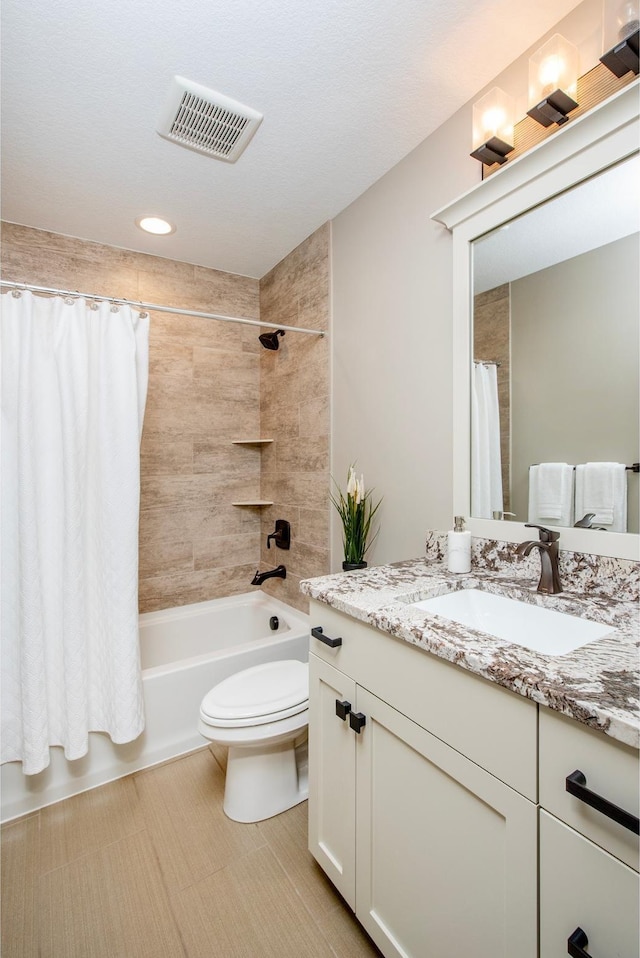 2728 Chowen Ave S, Minneapolis, MN 55416 - bathroom with toilet, visible vents, shower / tub combo with curtain, and vanity