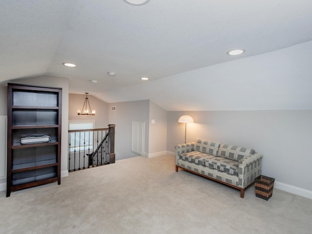 2728 Chowen Ave S, Minneapolis, MN 55416 - sitting room with carpet flooring, baseboards, vaulted ceiling, and an upstairs landing