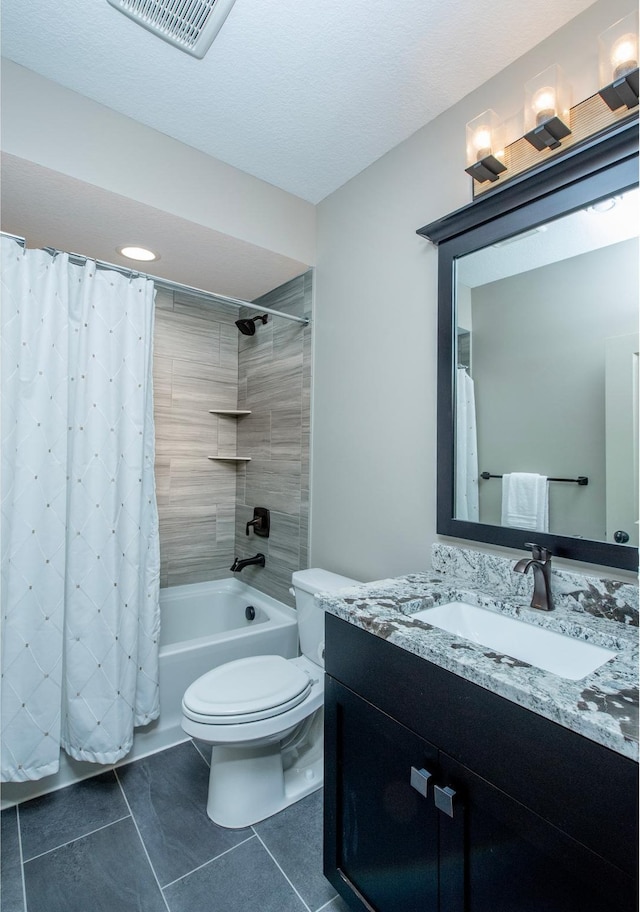 2728 Chowen Ave S, Minneapolis, MN 55416 - bathroom with visible vents, tile patterned flooring, vanity, toilet, and shower / tub combo
