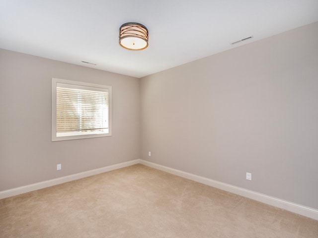 2728 Chowen Ave S, Minneapolis, MN 55416 - empty room featuring baseboards, light colored carpet, and visible vents