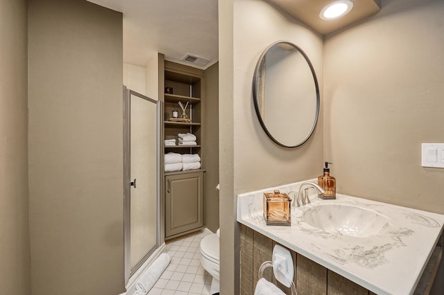 full bathroom with tile patterned flooring, vanity, toilet, visible vents, and a stall shower