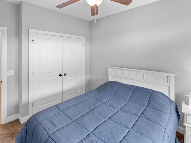 1128 Willowbrook Cir, Delano, MN 55328 - bedroom featuring carpet floors, a closet, and ceiling fan
