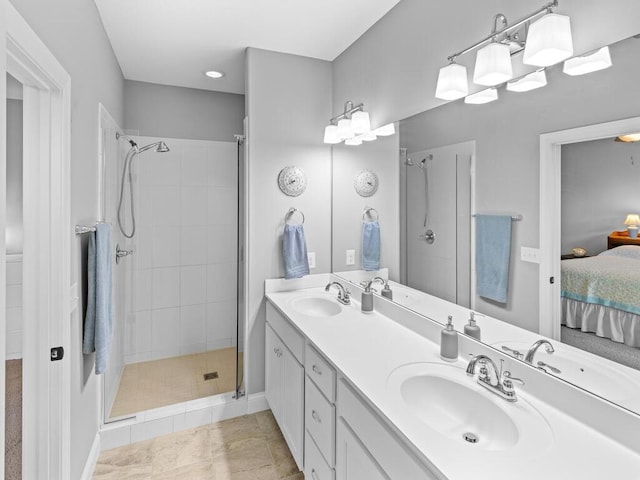 1128 Willowbrook Cir, Delano, MN 55328 - full bath featuring connected bathroom, a stall shower, double vanity, and baseboards