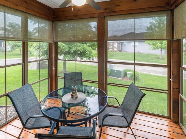 1128 Willowbrook Cir, Delano, MN 55328 - sunroom featuring outdoor dining space, ceiling fan, and plenty of natural light