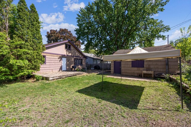 view of yard featuring a wooden deck