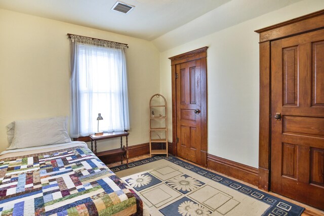 29058 132nd St, Waseca, MN 56093 - bedroom with baseboards and lofted ceiling