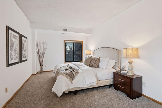 1235 Yale Pl Unit 207, Minneapolis, MN 55403 - bedroom with carpet floors, baseboards, and visible vents